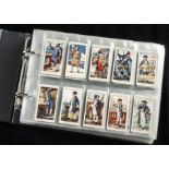 Cigarette Cards, Mixture, a Modern album containing over 600 Players 's cards sorted into part sets,