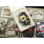 Postcards, Album, containing approx. 250 cards, mostly floral themed. Dated from the early 1900's