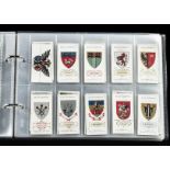 Cigarette Cards, Will's, a modern album containing a mixture of sets to include Ships Badges,