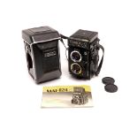 A Yashica Mat-124G TLR Camera, with maker's cap, case and instructions