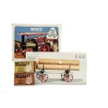 A Mamod TE1a Tablet or Spirit-fired Live Steam Traction Engine and LW1 Lumber Wagon: the engine