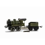 A Bing O Gauge Clockwork 'Minerva' 0-4-0 Locomotive and Tender: in GWR green as no 3410, G-VG, front