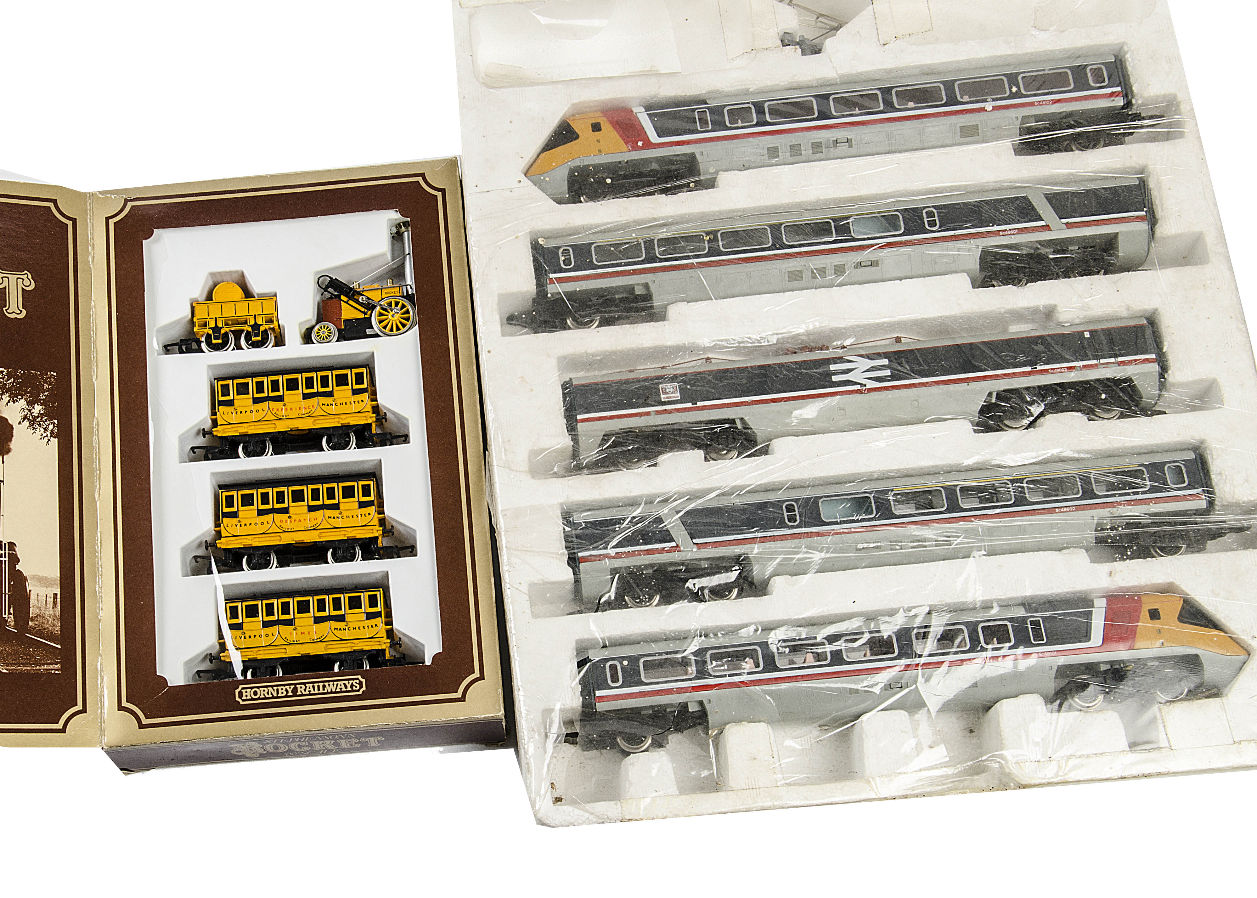 A Hornby 00 Gauge 'Stephenson's Rocket' Train Pack and Advanced Passenger Train Pack: Ancient and