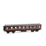 An Exley O Gauge LMS 1st Class Corridor Coach: in LMS maroon as no 7555 with interior detail,