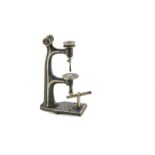 An early Bing Drilling Machine Accessory: for use with stationary steam engines, vertical drill with