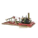 A Mamod SE3 Twin-Cylinder Spirit-fired Live Steam Engine and 'Workshop': The engine mounted on a
