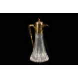 A Royal Brierly silver gilt mounted claret jug, London 1985 by Hennel Frazer & Haws, the lid opening