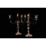 A pair of silver Queen Anne style three branch candelabra, Birmingham 1933 by Hawksworth, Eyre &