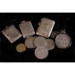 Two George V silver vesta cases and a collection of coins, one plain, and one with engraved