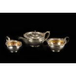 A George V silver three piece tea set, London 1915 by C.S. Harris & Sons Ltd. bearing the clan motto
