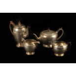 A four piece silver tea set, London 1920 by Charles & Richard Comyns, comprising tea pot, hot