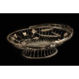 A silver bread basket, Sheffield 1906 by Richard Martin & Ebeneezer Hall, with applied vine and