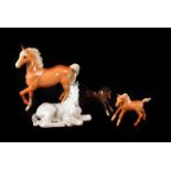 A Collection of Ceramic Horses, mostly Beswick, including foals and a beagle dog, some damage to