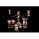 A collection of silver and silver plated items, including a modern silver three piece cruet set, a