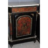 A Victorian Boulle work cabinet, having single door to front on bun feet with applied mounts,