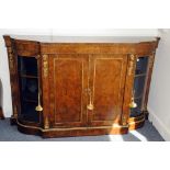 A fine Victorian walnut and inlaid credenza, having double doors to front opening to reveal