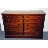 A Victorian mahogany double chest of drawers, having two sets of five graduated drawers with