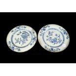 A pair of Chinese export porcelain Nanking cargo plates, with blue floral pattern on pale