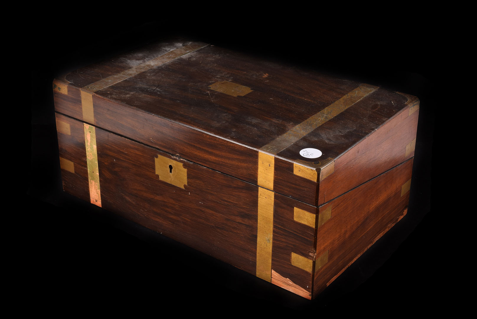 A mahogany writing slope, with brass mounts to corners and straps together with a smaller mahogany