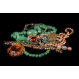 A collection of costume jewellery, including a Miracle bracelet, a Miracle Scottish themed brooch, a