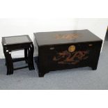 A 20th century Chinese camfour wood chest, with moulded dragon to lid and brass lock, together