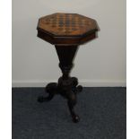 A Victorian walnut and inlaid work table, having chess board inlay to top opening to reveal fitted