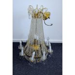 A fine 20th century Vienese chandelier ceiling light, having multiple strands of faceted beads, on a