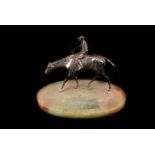 An Art Deco period silver plated and marble cigar ashtray, having a plated figure of a horse and