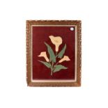 An Edwardian period wool picture, the needlework image of a lily of the valley in frame, together