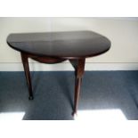 A 19th century oak pad foot table, with oval drop leaves