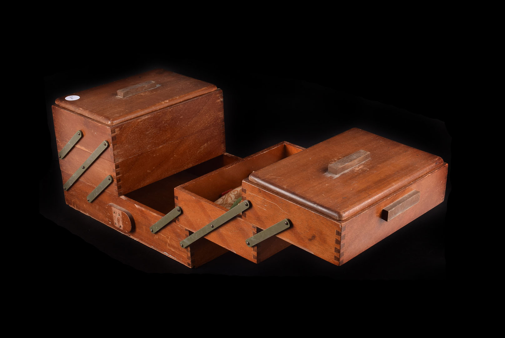 A wooden cantilever sewing box, with 3 tier construction and 5 compartments together with a small