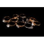 A collection of 18ct and 9ct gold diamond and gem set rings, including seven 9ct gold examples,