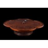 An Edwardian table " Lazy Susan", quatrefoil shape in mahogany with boxwood and ebony dash inlay