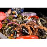 A quantity of costume jewellery, including various beads, bangles, brooches and other items