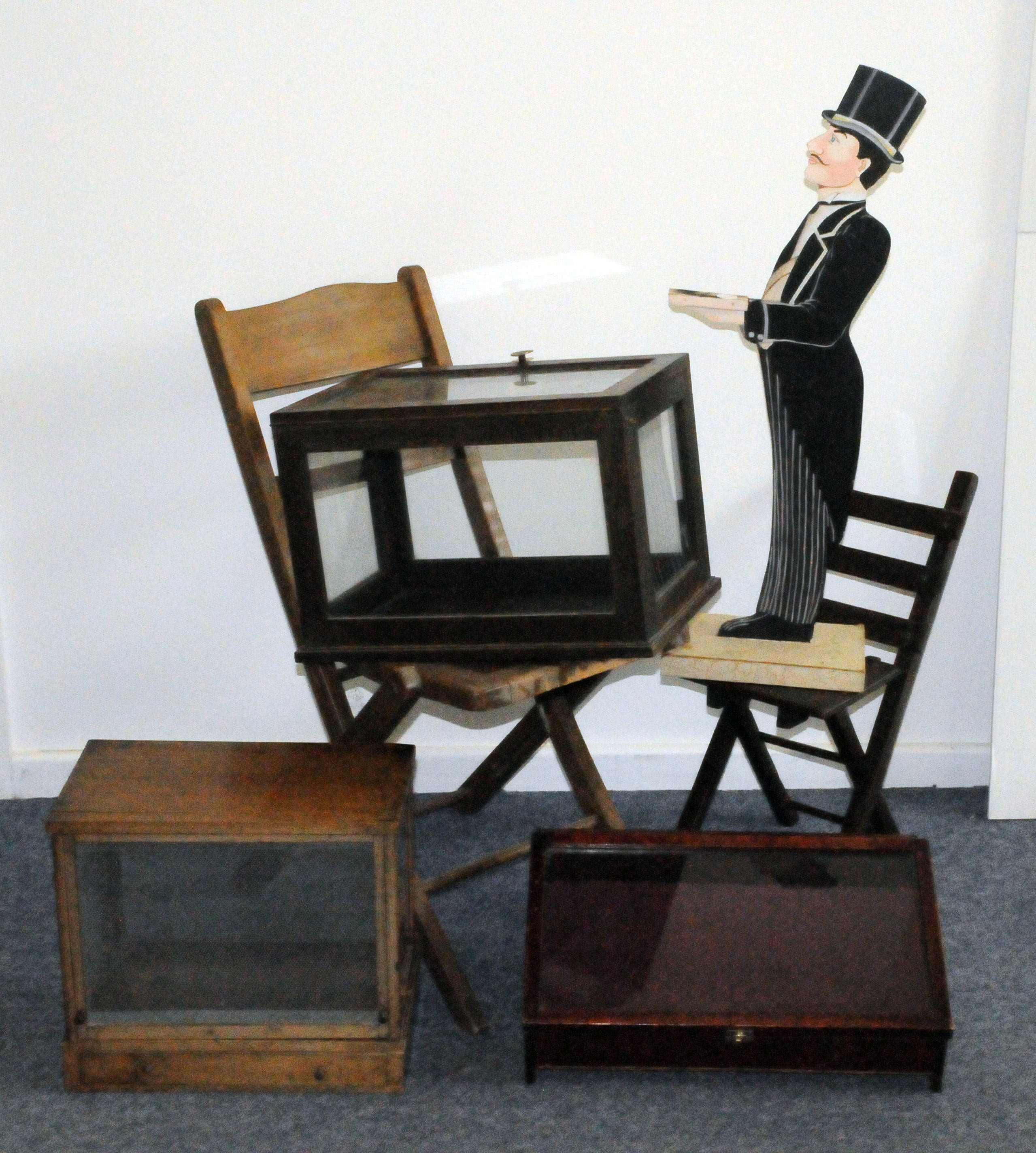 A vintage painted waiter, lacking tray, together with two folding chairs, a table top display, a