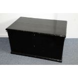 A vintage black painted pine chest