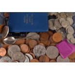 A collection of 20th century coins, including commemorative crowns, indented coin folders copper and