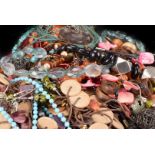 A quantity of costume jewellery, including various beads, bangles, brooches and other items