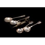 A collection of white metal and silver plated flatware, including a set of six far Eastern coffee