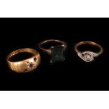 A group of three vintage gold ring, including a good tourmaline dress ring, an Art Deco crossover,