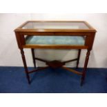 An Edwardian style bijouterie cabinet, on fluted legs with x-frame stretcher 83cm W