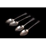 A group of four Georgian silver table spoons, each old English pattern and bearing initials to