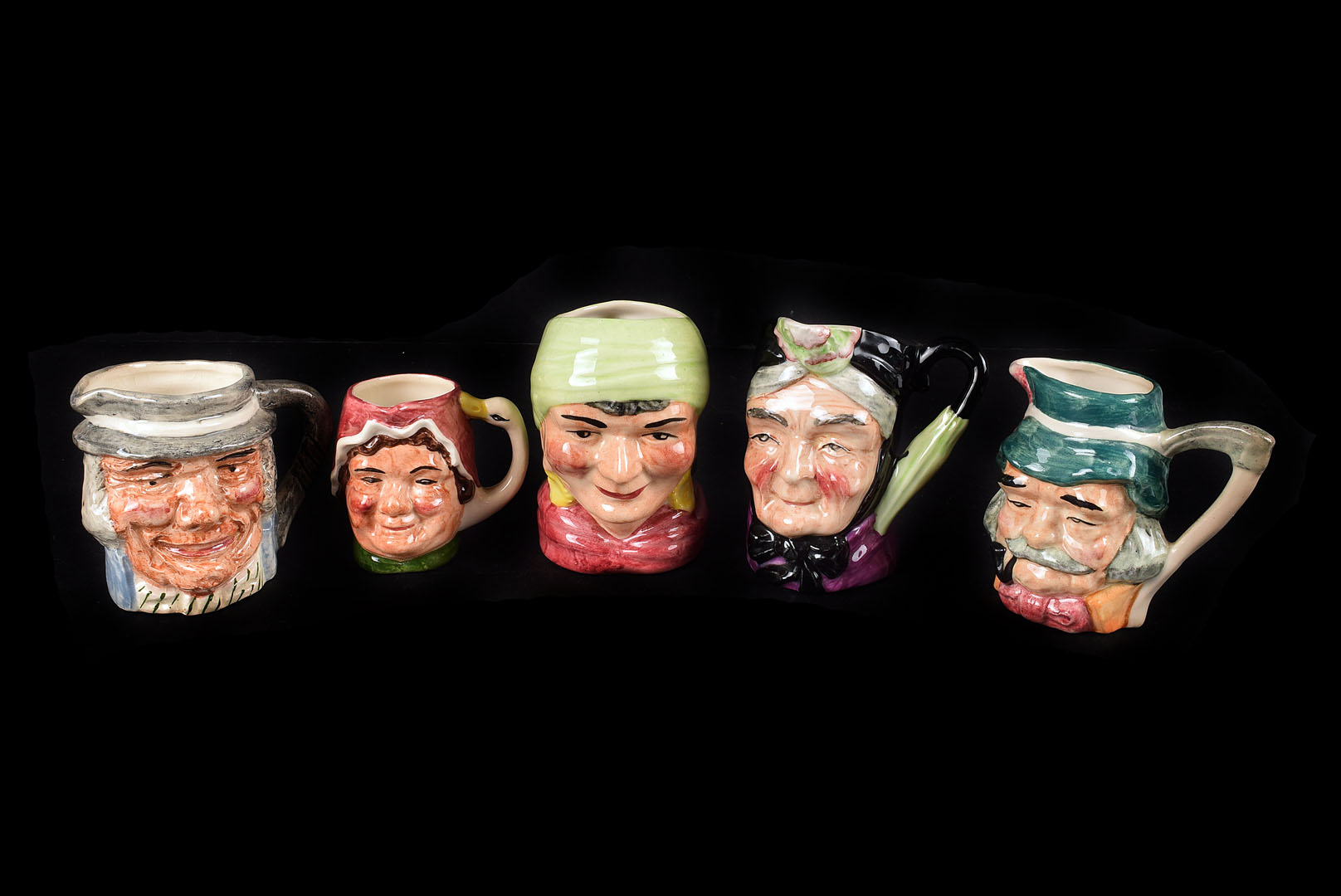 A collection of Mixed Character Toby Jugs, manufactured by Artone Staffordshire, characters to
