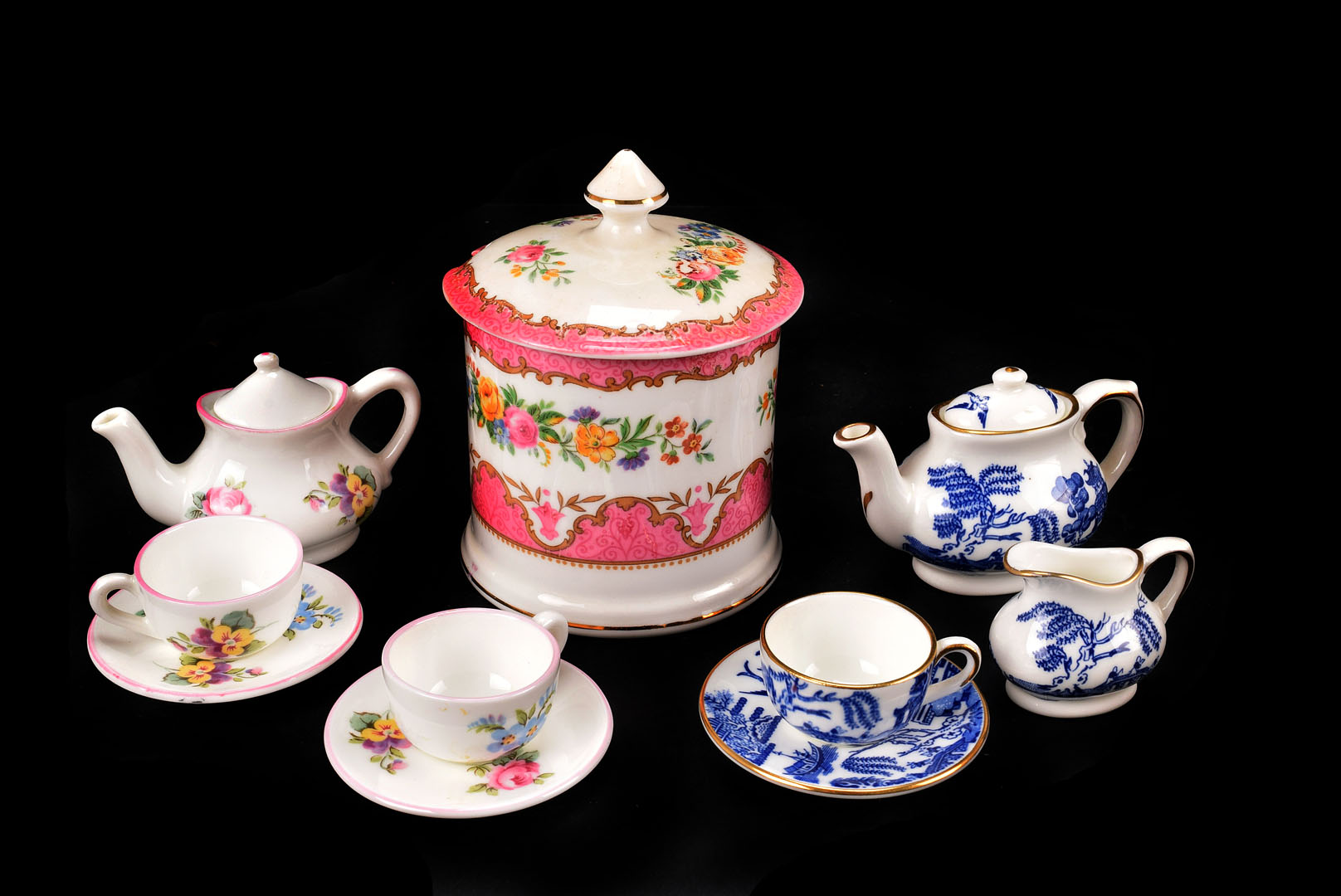 A collection of Miniature Ceramics, including Coalport, child's part tea set in Willow pattern,