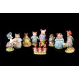A collection of 12 Beswick Beatrix Potter figures, including Ribby, Tom Kitten, Miss Moppet,