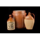 A F.Brien & Co 'Green Man' stoneware distillery flask, together with a further collection of