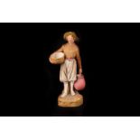 A mid 20th century Royal Dux porcelain figure, modelled as a young boy with basket and vessel,