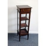 A pretty Edwardian mahogany and inlaid tower display cabinet, having small drawer above glazed