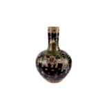 A large and impressive Chinese porcelain Famille noire bottle vase, having black ground and