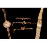 A 1950s Jaeger LeCoultre lady's 9ct gold wristwatch, no. 7500, the small silvered dial with raised